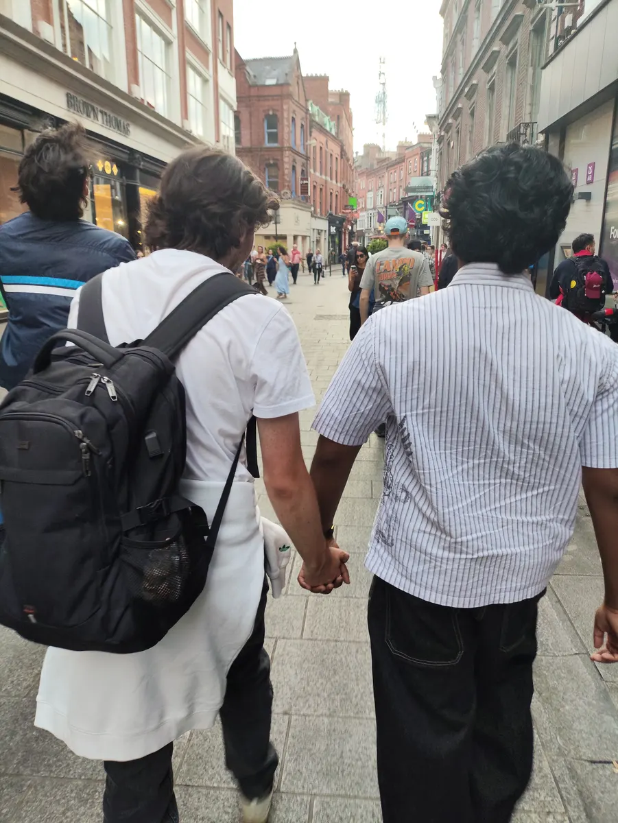 Friends walking through Dublin